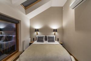 Szczawnica Park Resort & Spa客房内的一张或多张床位