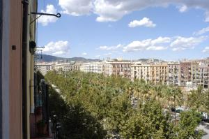 a view of a city with buildings and trees at My Address in Barcelona Downtown in Barcelona