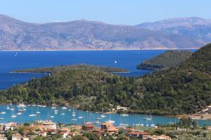 a view of a bay with boats in the water at Kores Villas in Nydri