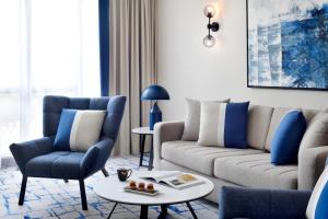Posezení v ubytování Mövenpick Hotel & Apartments Bur Dubai