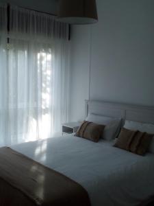 Кровать или кровати в номере Precioso, luminoso y cómodo