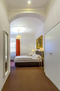 Postel nebo postele na pokoji v ubytování Hotel Adler