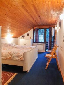 Postel nebo postele na pokoji v ubytování Holiday Villa Ruprechtice