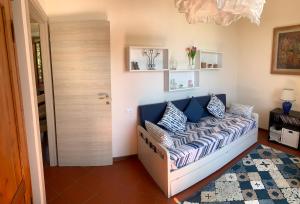 A bed or beds in a room at Villa Monica