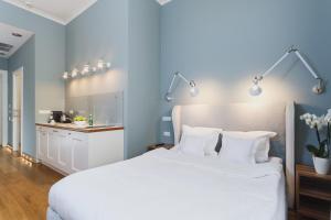 Postel nebo postele na pokoji v ubytování Apartamenty Bracka 6