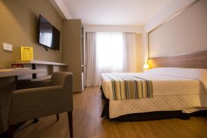 Cama ou camas em um quarto em Viale Cataratas Hotel & Eventos