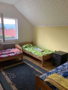 Postel nebo postele na pokoji v ubytování Idila