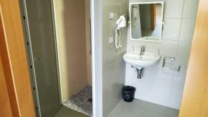 Koupelna v ubytování Alcocebre Suites Hotel