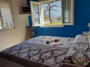 Łóżko lub łóżka w pokoju w obiekcie Il Rifugio Del Tempo