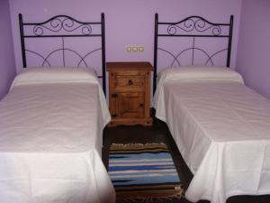 Postel nebo postele na pokoji v ubytování Casas Rurales Manolo