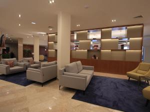 Lobbyn eller receptionsområdet på Consolata Hotel