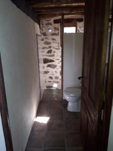Een badkamer bij Alojamiento Los Chozos
