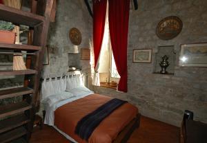 Posteľ alebo postele v izbe v ubytovaní La Martellina B&B