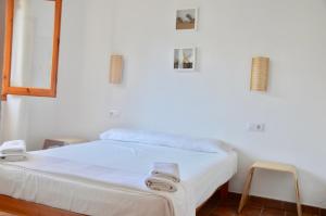 Ένα ή περισσότερα κρεβάτια σε δωμάτιο στο Villa Gaya +60 φωτογραφίες