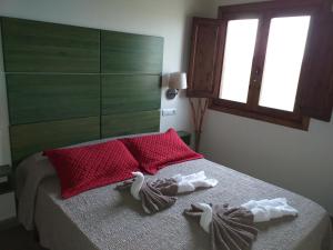 Postel nebo postele na pokoji v ubytování Mas dels Bonos