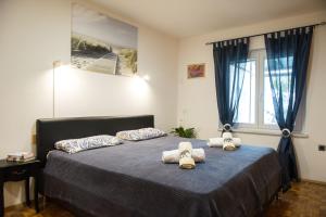 מיטה או מיטות בחדר ב-Apartma soline Seča