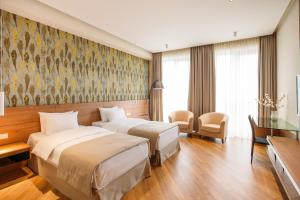 Hotel Tbilisi Tower客房内的一张或多张床位