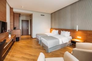 Hotel Tbilisi Tower客房内的一张或多张床位