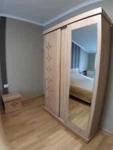 Postel nebo postele na pokoji v ubytování gogoli family hotel