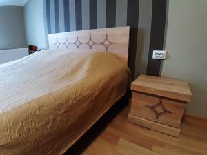 Postel nebo postele na pokoji v ubytování gogoli family hotel