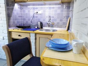 Köök või kööginurk majutusasutuses Apartmani Sirmium