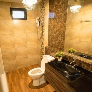 Koupelna v ubytování GetZleep House Sattahip