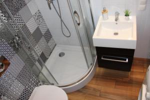 Koupelna v ubytování SMM Apartament Stettin