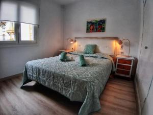 Tempat tidur dalam kamar di En el corazon de Marbella