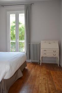 Postel nebo postele na pokoji v ubytování La KEFOISE