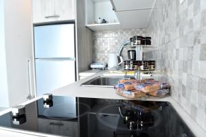 A kitchen or kitchenette at Central Athens Studios