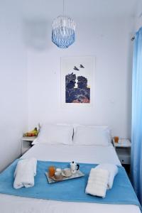 A bed or beds in a room at Central Athens Studios