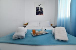 A bed or beds in a room at Central Athens Studios
