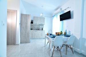 A kitchen or kitchenette at Central Athens Studios