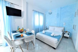 A bed or beds in a room at Central Athens Studios