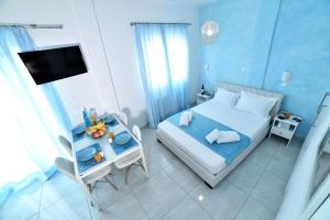 A bed or beds in a room at Central Athens Studios