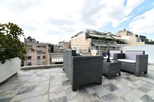 A balcony or terrace at Central Athens Studios