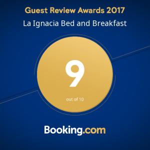 a yellow circle with the number on it at La Ignacia Bed and Breakfast in Pilar