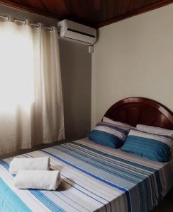 Postel nebo postele na pokoji v ubytování Hotel Monte Carlo