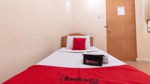 Voodi või voodid majutusasutuse RedDoorz @ Downtown Tacloban toas