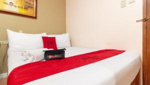 Voodi või voodid majutusasutuse RedDoorz @ Downtown Tacloban toas