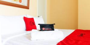 Voodi või voodid majutusasutuse RedDoorz @ Downtown Tacloban toas
