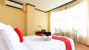 Voodi või voodid majutusasutuse RedDoorz @ Downtown Tacloban toas
