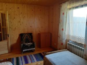Postel nebo postele na pokoji v ubytování WoodDream