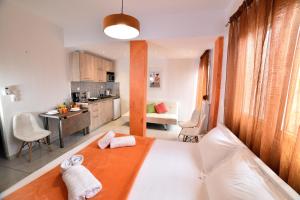 A bed or beds in a room at Central Athens Studios