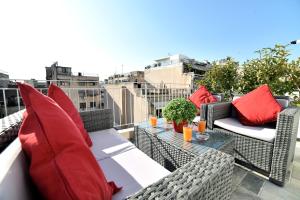 A balcony or terrace at Central Athens Studios