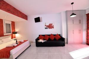 A bed or beds in a room at Central Athens Studios