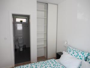 Posteľ alebo postele v izbe v ubytovaní Friends & Family Apartmanok Velence
