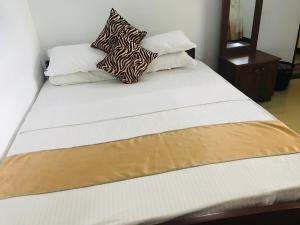 Giường trong phòng chung tại Freedom Lodge Yala