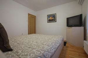 Postel nebo postele na pokoji v ubytování Guesthouse Rota