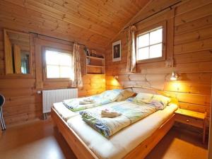 Säng eller sängar i ett rum på Ferienhof Pfeiffer